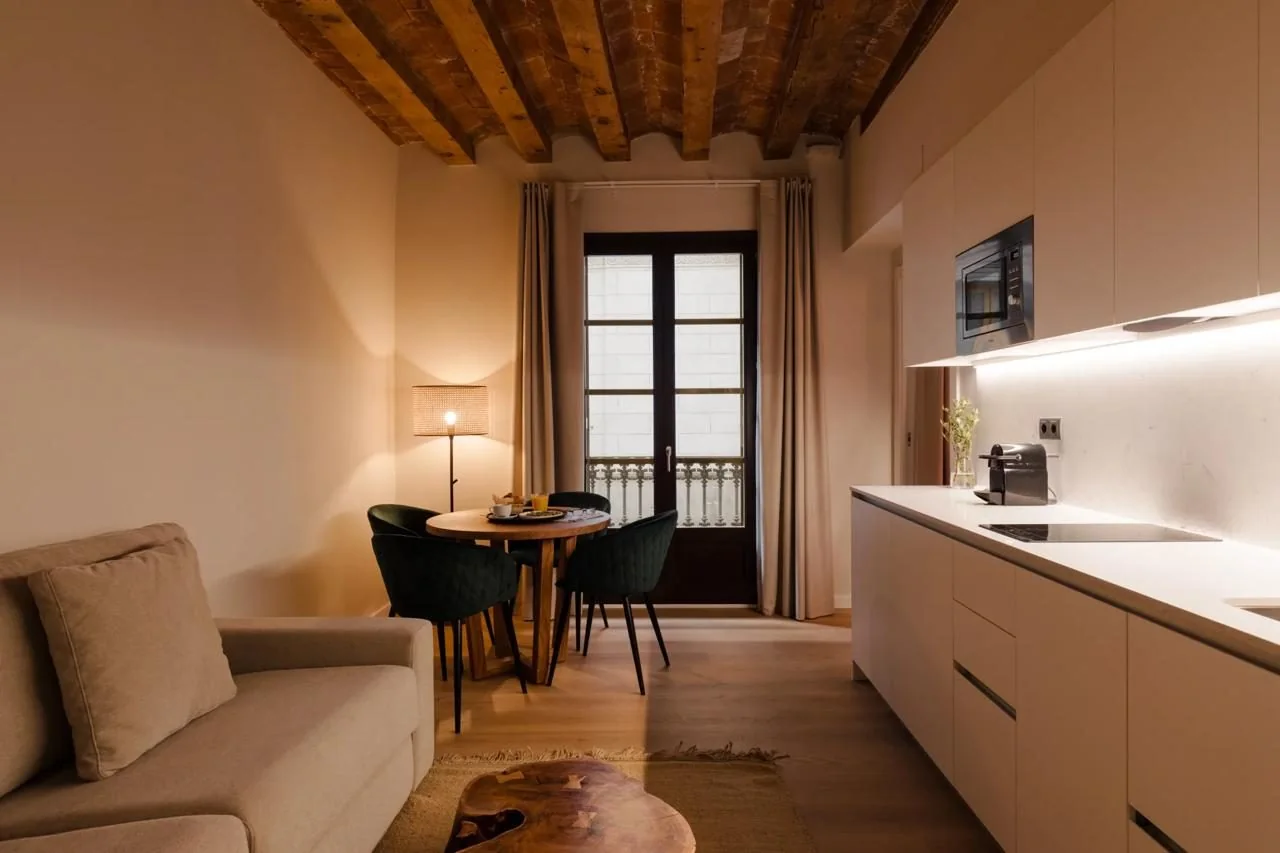 Living room with sofa, table and window