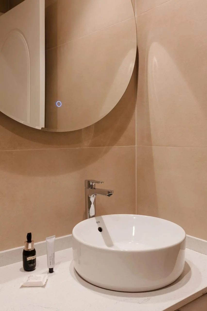 Bathroom washbasin and mirror detail